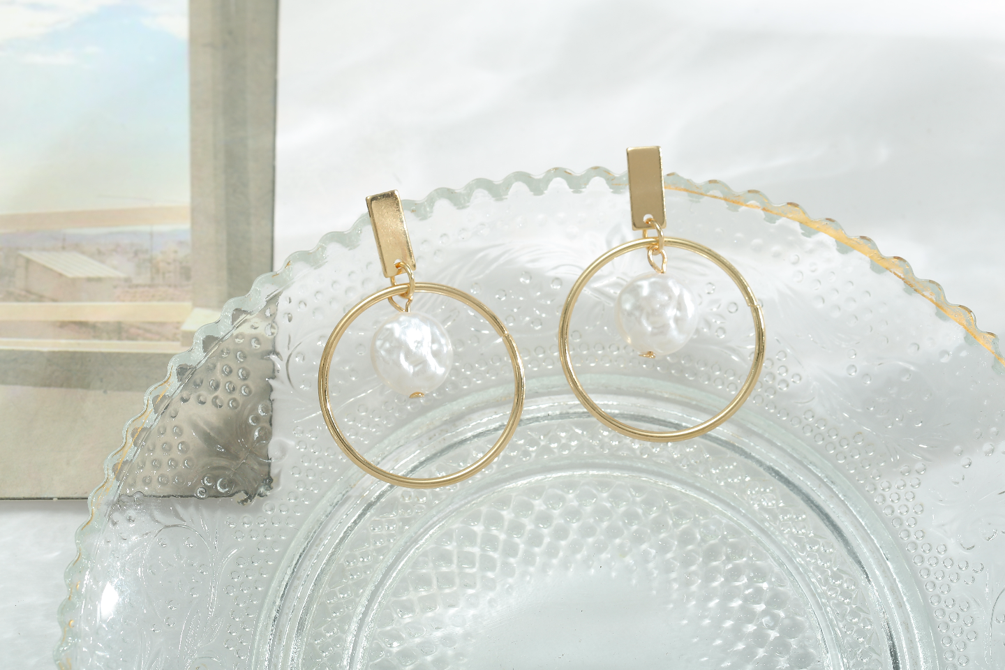 Gold pearl earrings