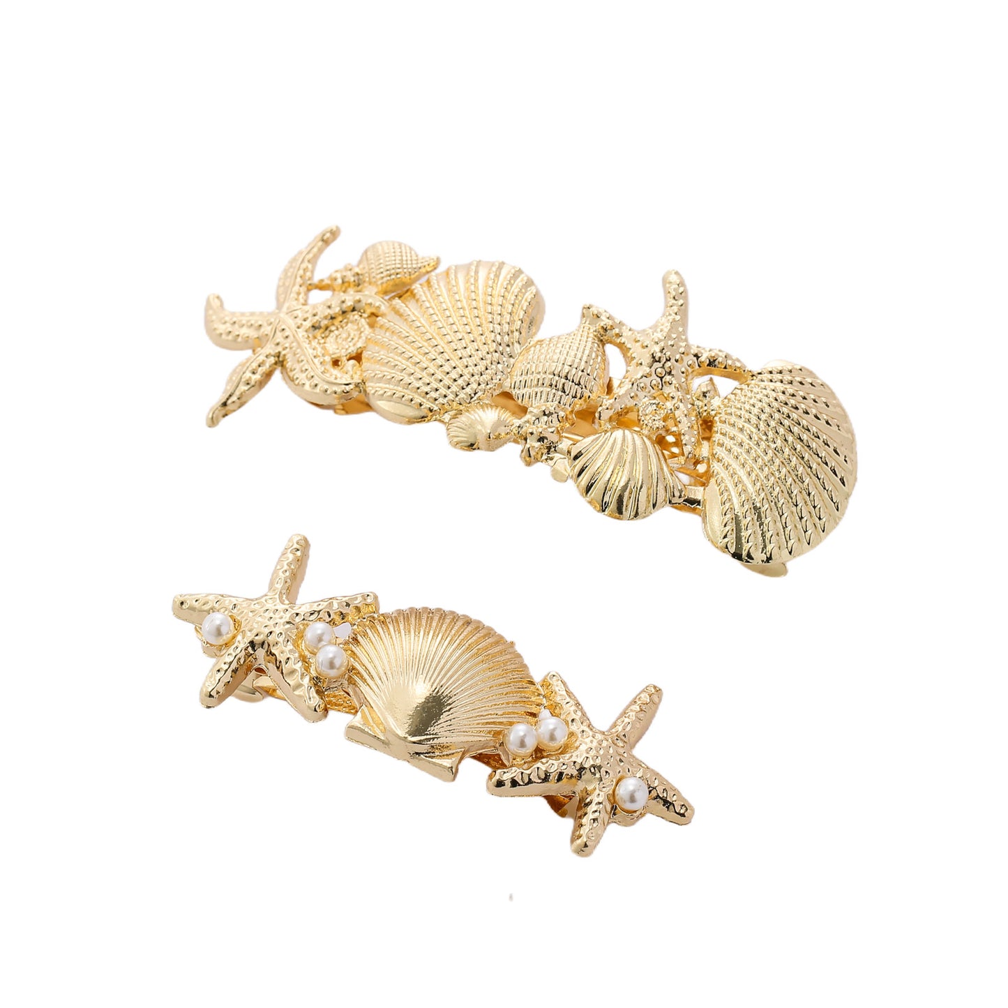 2x Haarspeld goud schelpen